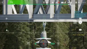 Middle-phase cross-arm attachment of 500 kV pull tower in drone simulator.