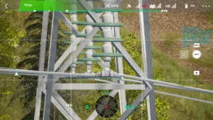 Drone simulator screenshot inspecting the right phase wire end attachment of a 220kV linear tower