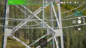 Jumper conductor end of right upper phase on the 500 kV tension tower captured in drone simulator inspection.