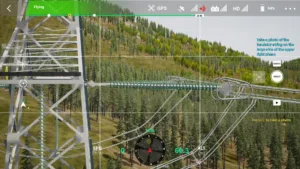 Large-side insulator of right upper phase on the 500 kV tension tower captured in drone simulator inspection.