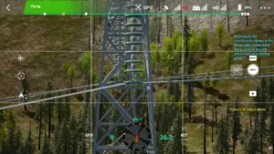Drone simulator screenshot inspecting the left phase wire end attachment of a 220kV linear tower