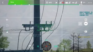 Fourth disconnector on a 10kV terminal pole captured in drone-based power training environment.