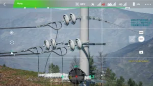 Left-side insulator of a 10kV terminal pole shown in UAV electrical line simulation.