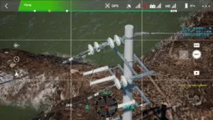 Top insulator assembly of a 10kV terminal pole captured in drone simulation training.